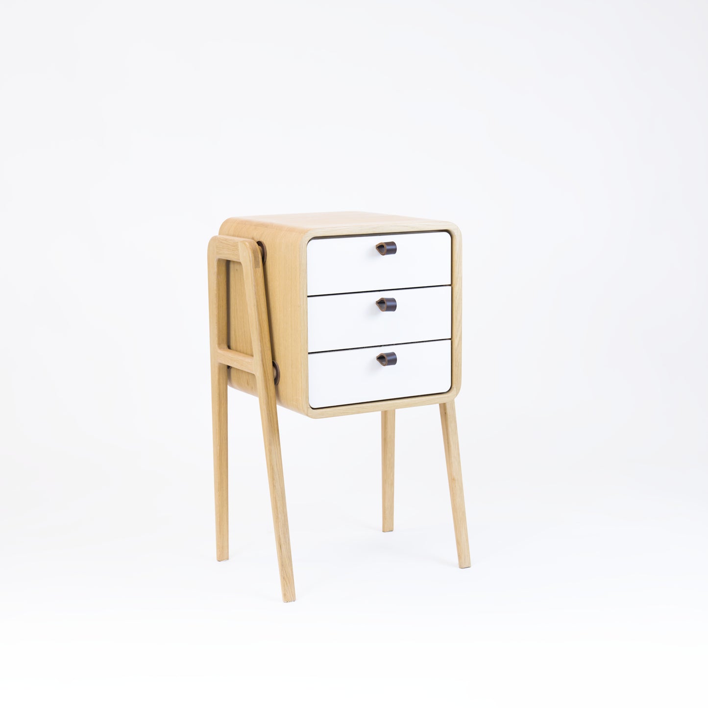 High nightstand nm31H. The main corpus is crafted from solid Norwegian oak, featuring 3 drawers with white front.