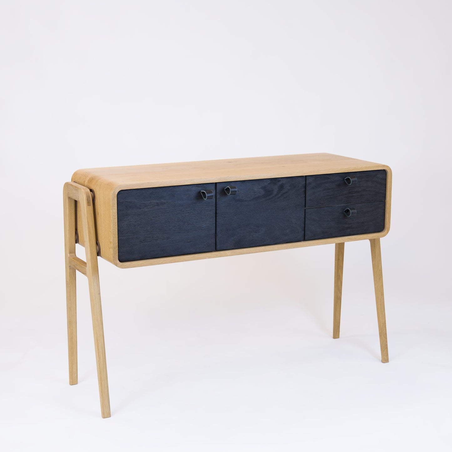High sideboard nm23H. The main corpus is crafted from solid Norwegian oak, featuring 2 doors and 2 right drawers, all with black oak fronts.