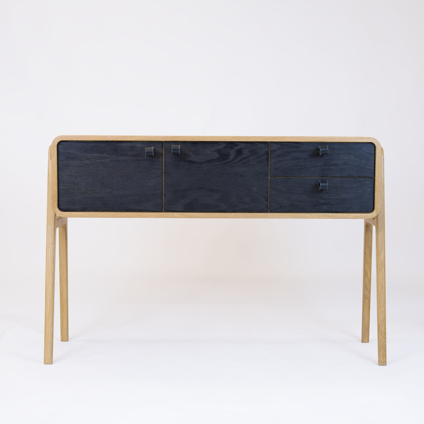 High sideboard nm23H. The main corpus is crafted from solid Norwegian oak, featuring 2 doors and 2 right drawers, all with black oak fronts.