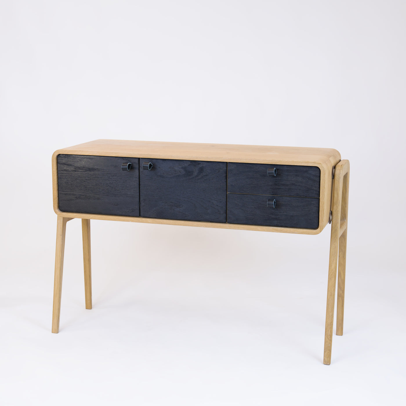 High sideboard nm23H. The main corpus is crafted from solid Norwegian oak, featuring 2 doors and 2 right drawers, all with black oak fronts.