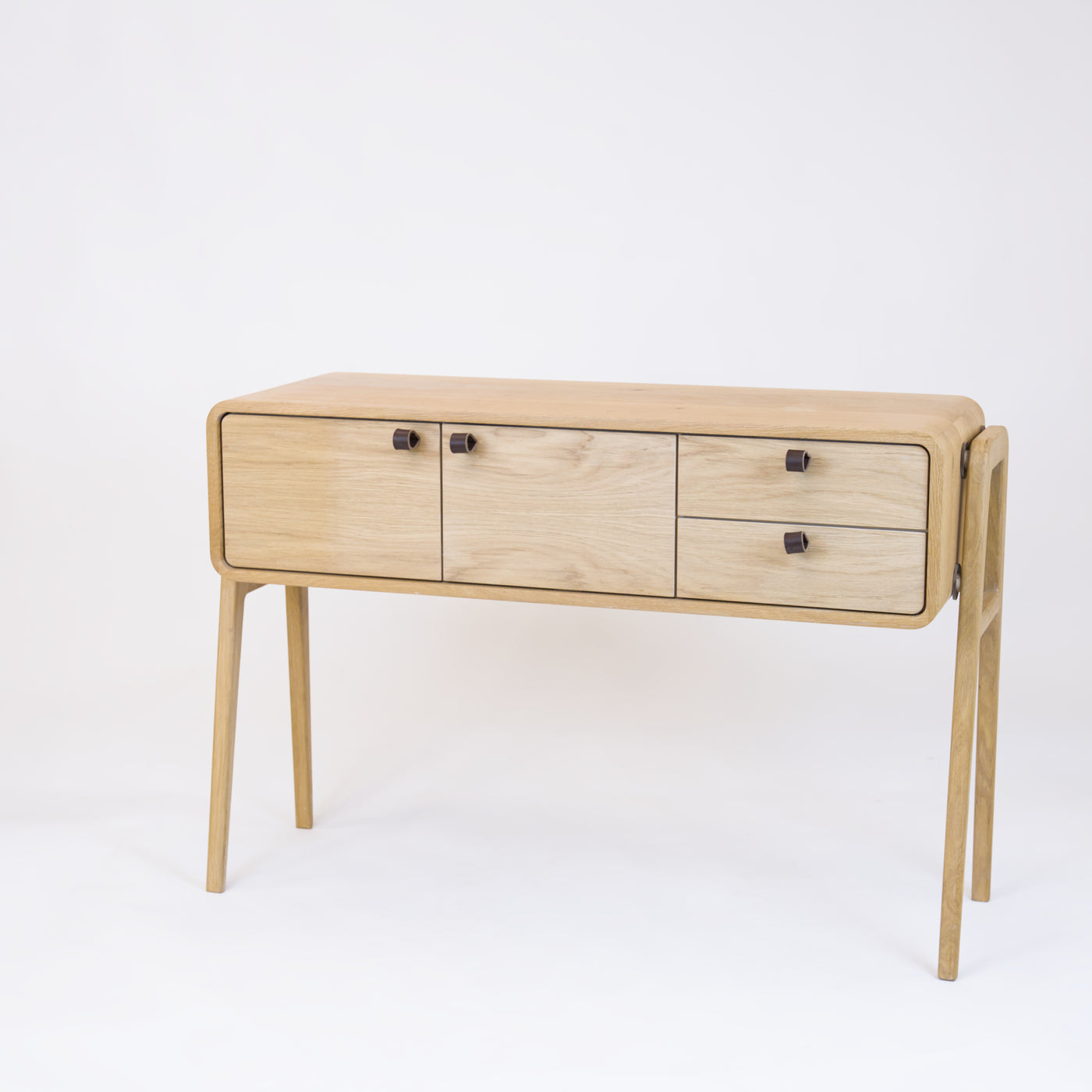 High sideboard nm23H. The main corpus is crafted from solid Norwegian oak, featuring 2 doors and 2 right drawers, all with natural oak fronts.