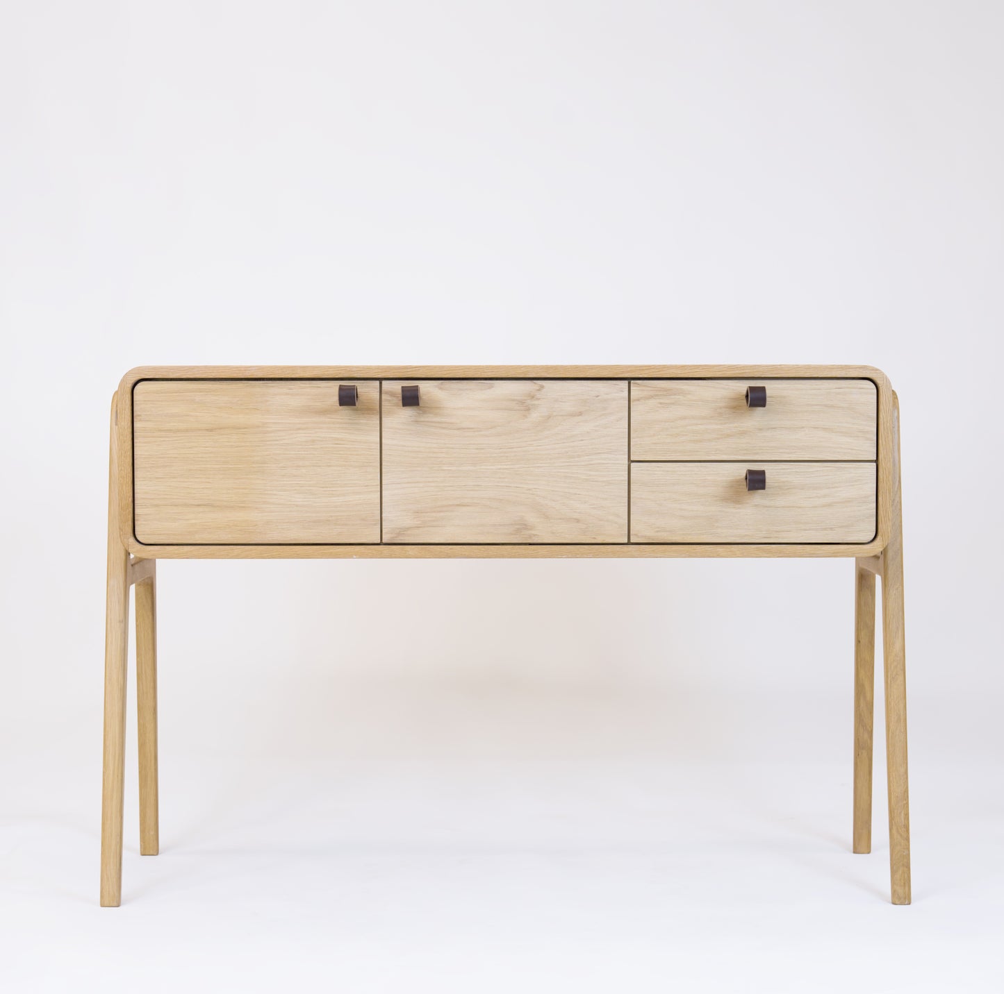 High sideboard nm23H. The main corpus is crafted from solid Norwegian oak, featuring 2 doors and 2 right drawers, all with natural oak fronts.