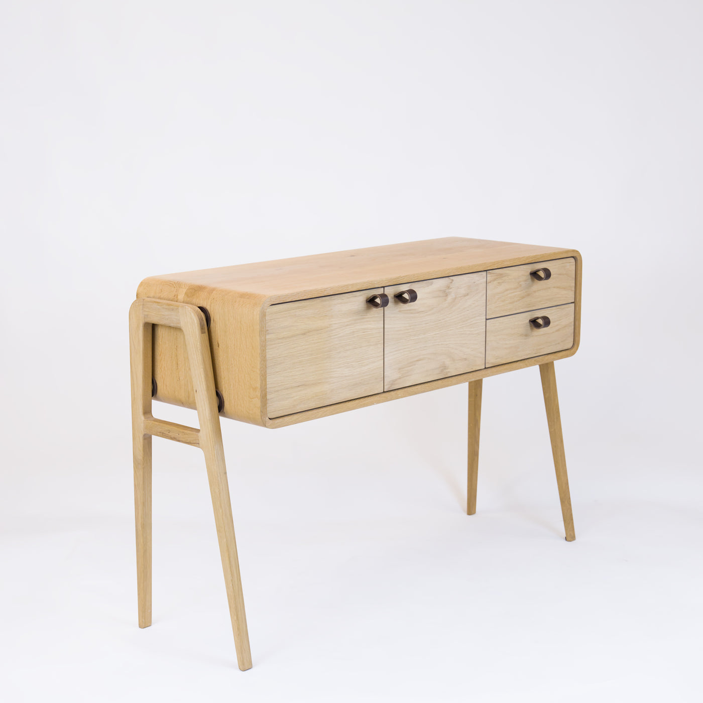 High sideboard nm23H. The main corpus is crafted from solid Norwegian oak, featuring 2 doors and 2 right drawers, all with natural oak fronts.