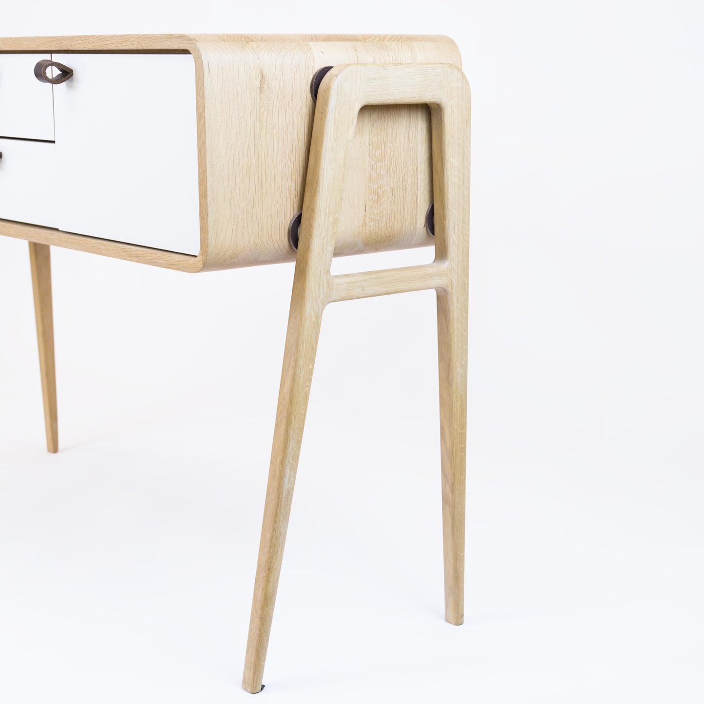 High sideboard nm23H. The main corpus is crafted from solid Norwegian oak, featuring 2 doors and 2 drawers in the middle, all with white fronts.