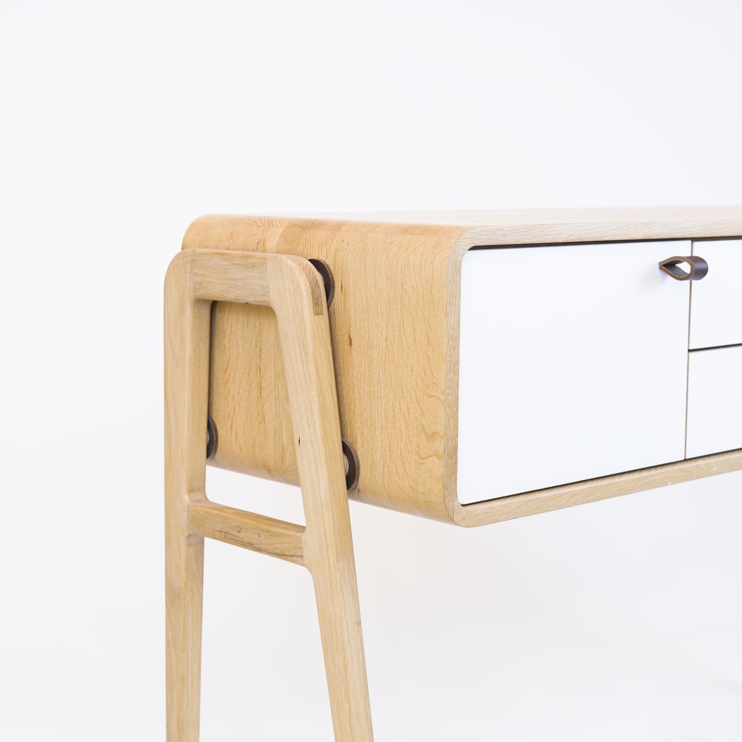 High sideboard nm23H. The main corpus is crafted from solid Norwegian oak, featuring 2 doors and 2 drawers in the middle, all with white fronts.