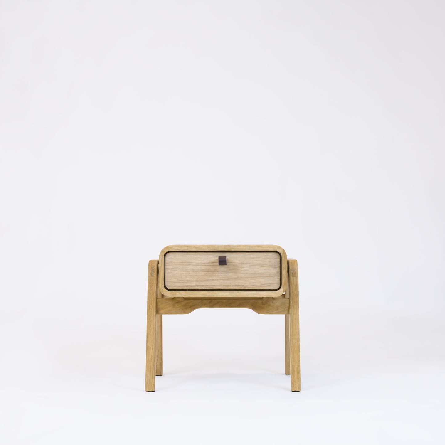 Low desk and storage bench nm11L. The main corpus is crafted from solid Norwegian oak, featuring 1 drawer with natural oak front.