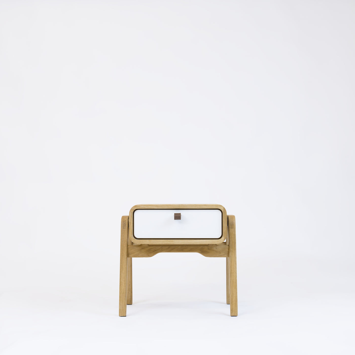 Low desk and storage bench nm11L. The main corpus is crafted from solid Norwegian oak, featuring 1 drawer with white front.