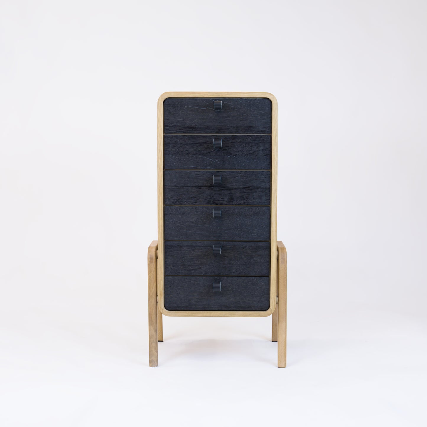 Low drawer unit nm61L. The main corpus is crafted from solid Norwegian oak, featuring 6 drawers with black oak front.