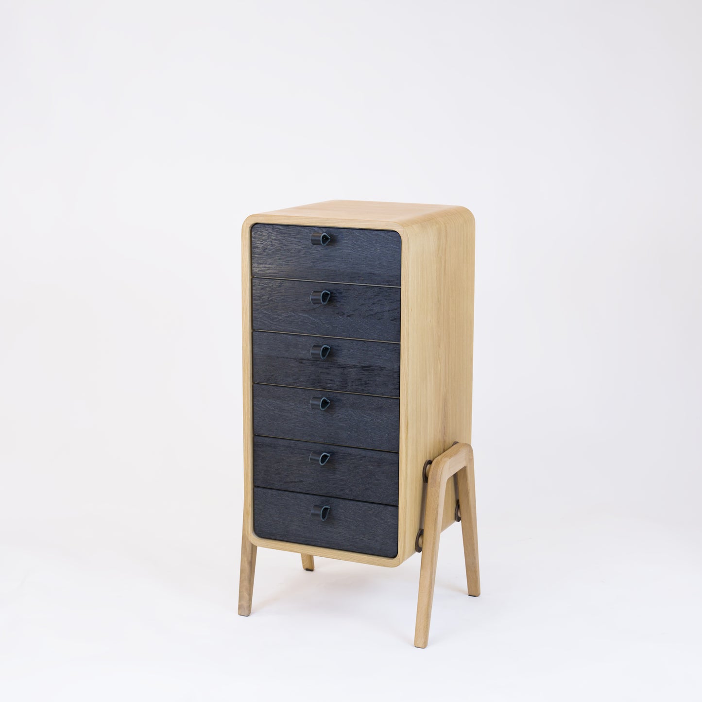 Low drawer unit nm61L. The main corpus is crafted from solid Norwegian oak, featuring 6 drawers with black oak front.