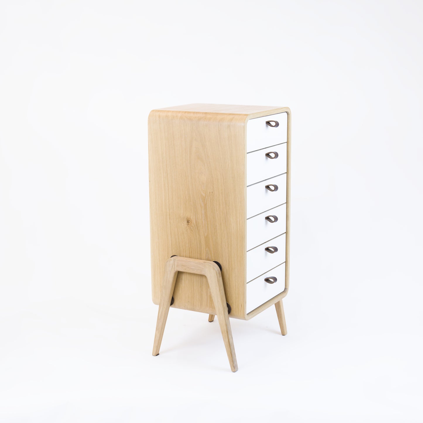 Low drawer unit nm61L. The main corpus is crafted from solid Norwegian oak, featuring 6 drawers with white front.