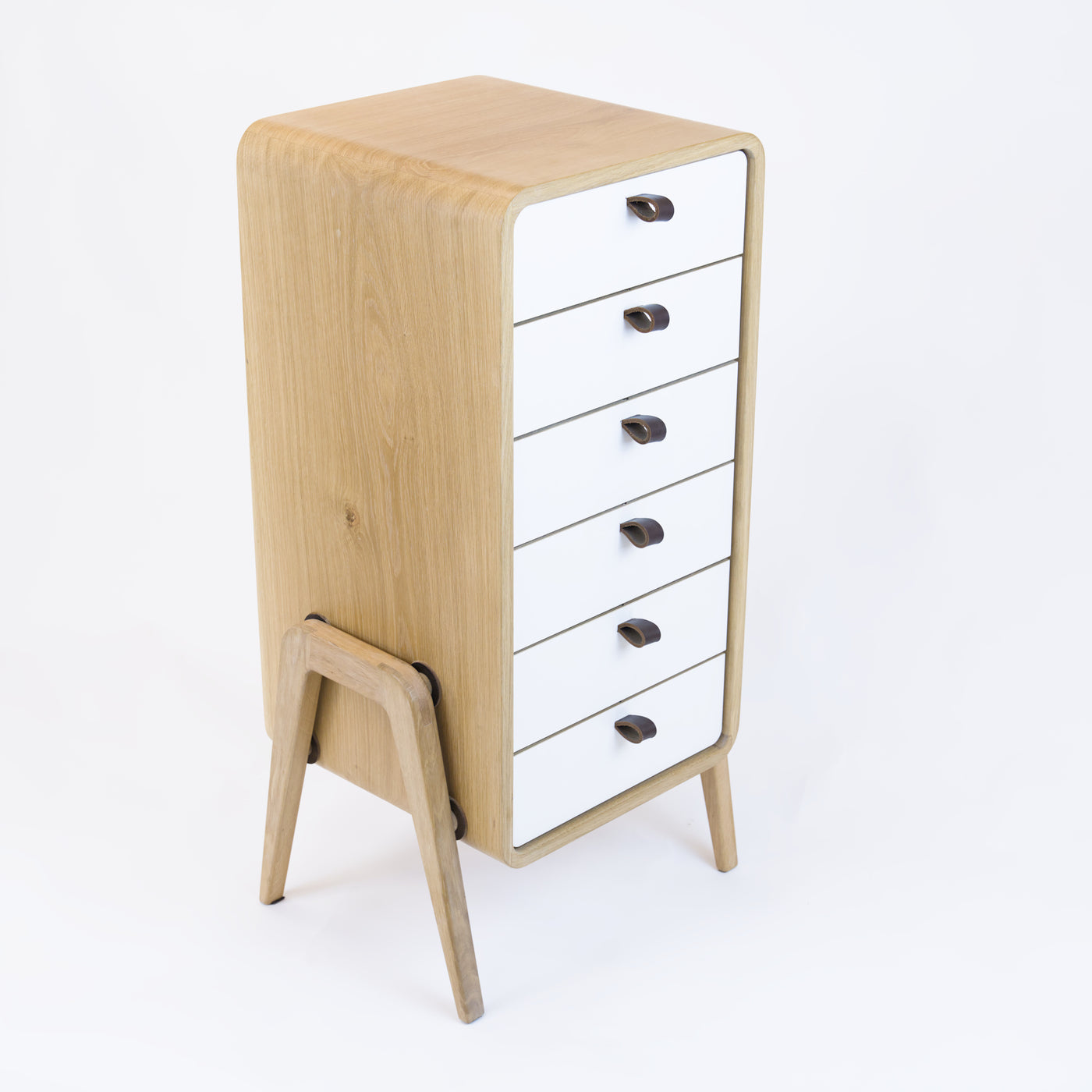 Low drawer unit nm61L. The main corpus is crafted from solid Norwegian oak, featuring 6 drawers with white front.