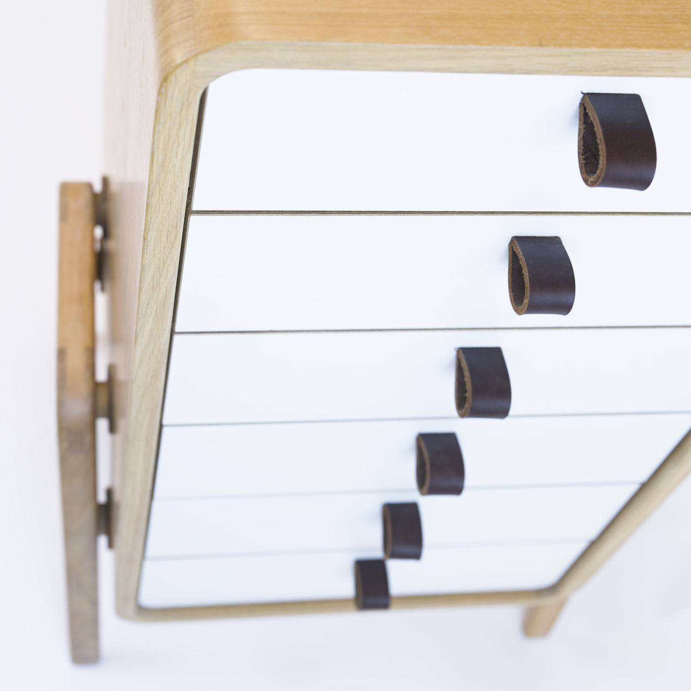Low drawer unit nm61L. The main corpus is crafted from solid Norwegian oak, featuring 6 drawers with white front.