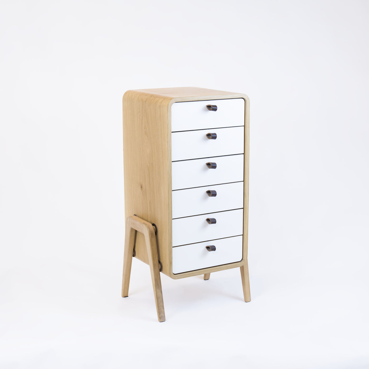 Low drawer unit nm61L. The main corpus is crafted from solid Norwegian oak, featuring 6 drawers with white front.