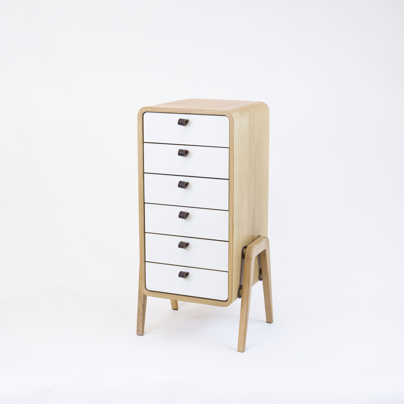 Low drawer unit nm61L. The main corpus is crafted from solid Norwegian oak, featuring 6 drawers with white front.
