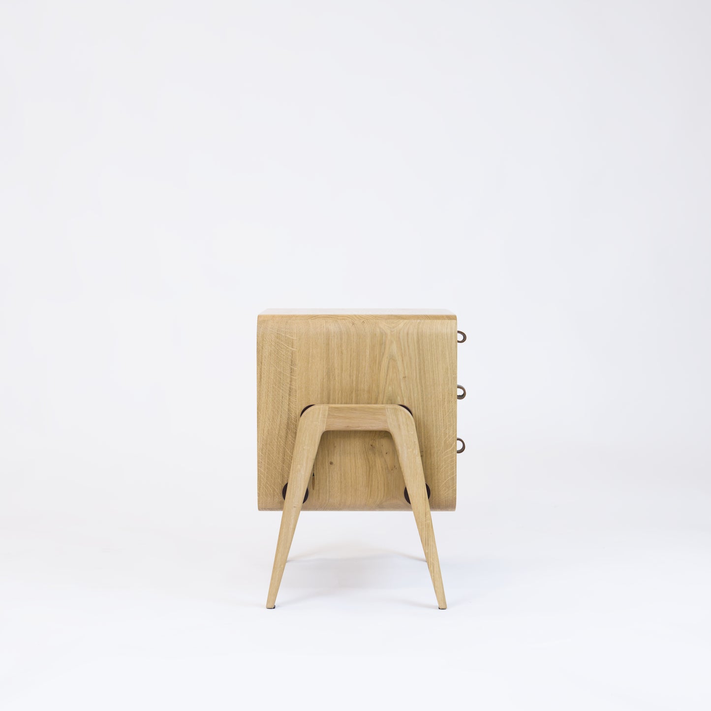 Low nightstand nm31L. The main corpus is crafted from solid Norwegian oak, featuring 3 drawers with black oak front.