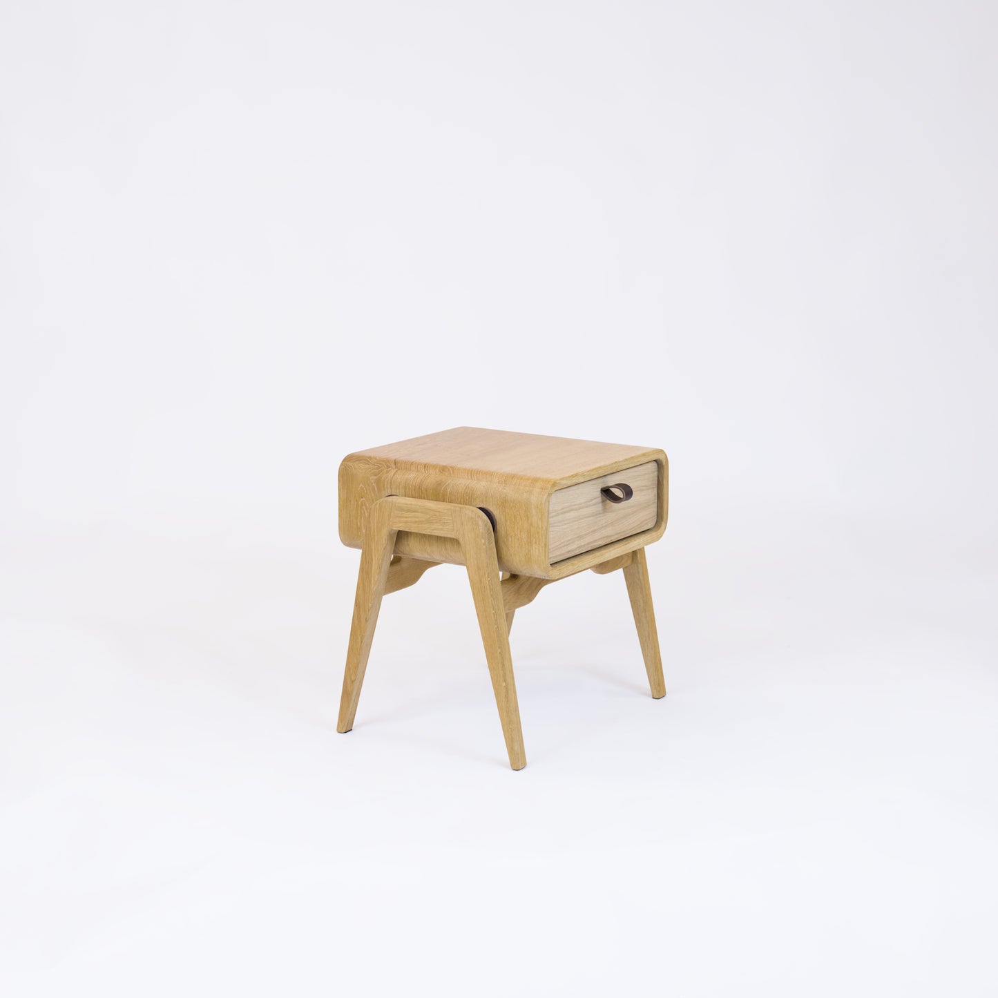 Low nightstand nm11L. The main corpus is crafted from solid Norwegian oak, featuring 1 drawer with natural oak front.