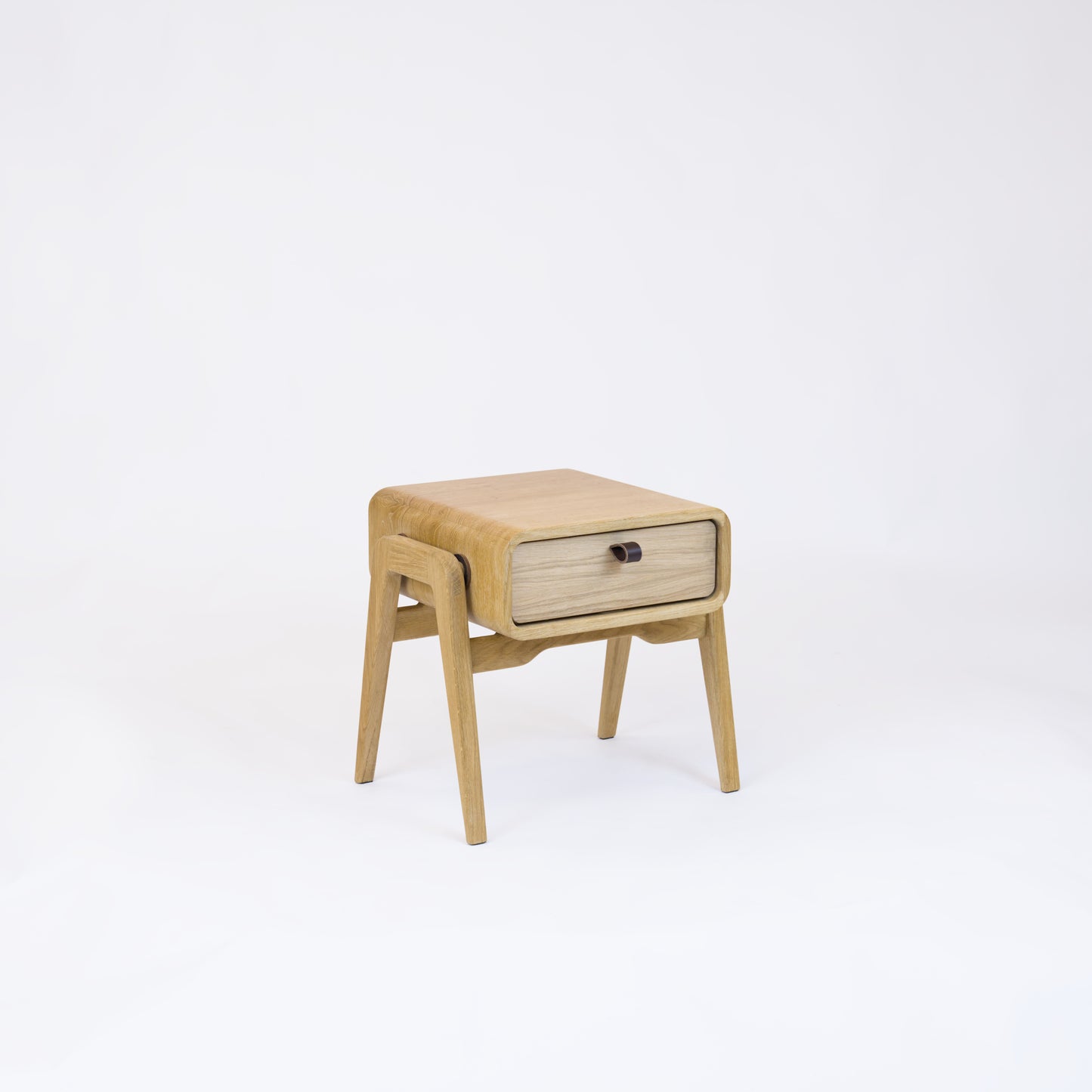 Low nightstand nm11L. The main corpus is crafted from solid Norwegian oak, featuring 1 drawer with natural oak front.