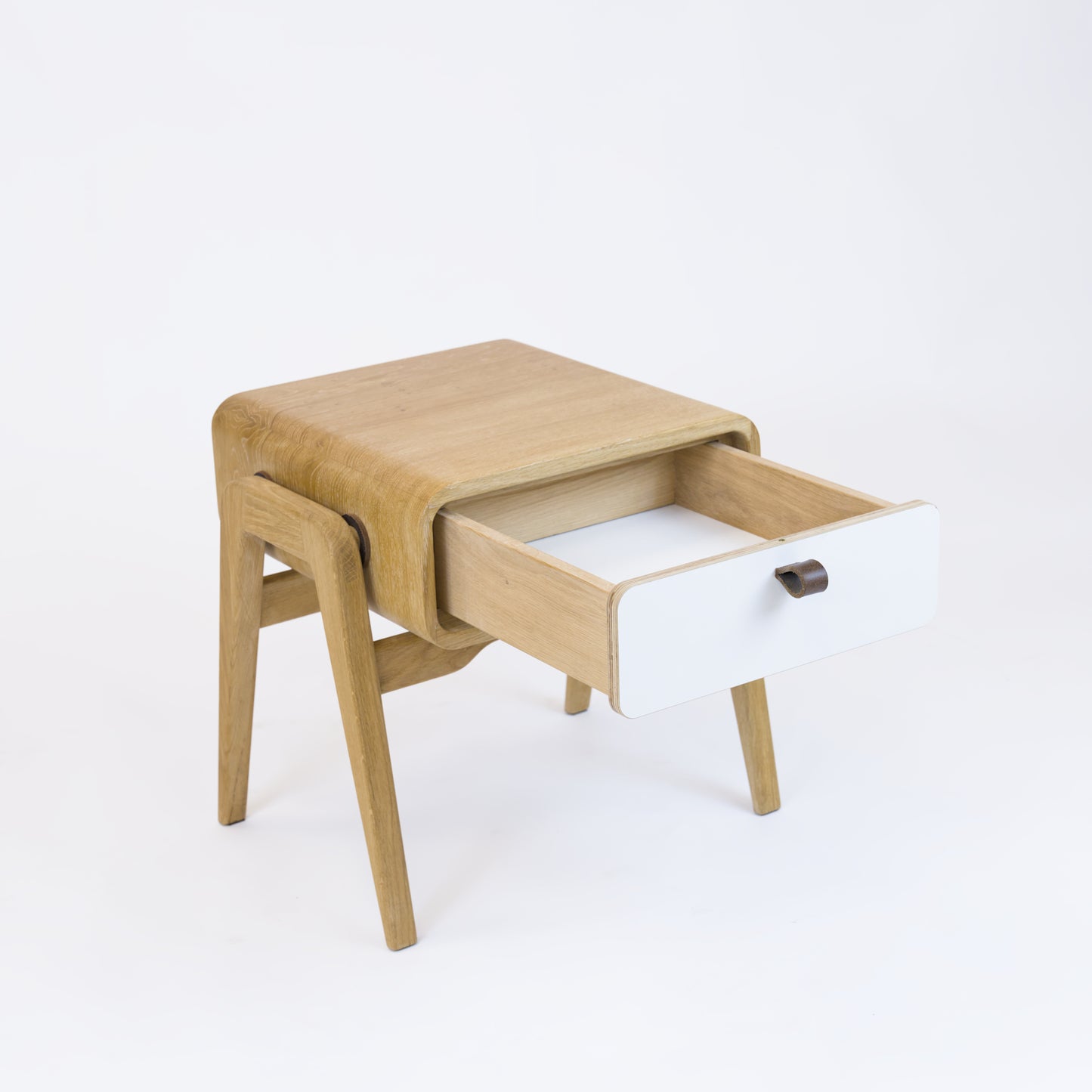 Low nightstand nm11L. The main corpus is crafted from solid Norwegian oak, featuring 1 drawer with white front.