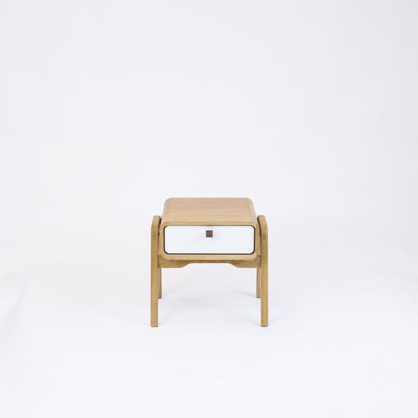 Low nightstand nm11L. The main corpus is crafted from solid Norwegian oak, featuring 1 drawer with white front.