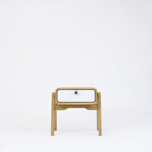 Low nightstand nm11L. The main corpus is crafted from solid Norwegian oak, featuring 1 drawer with white front.