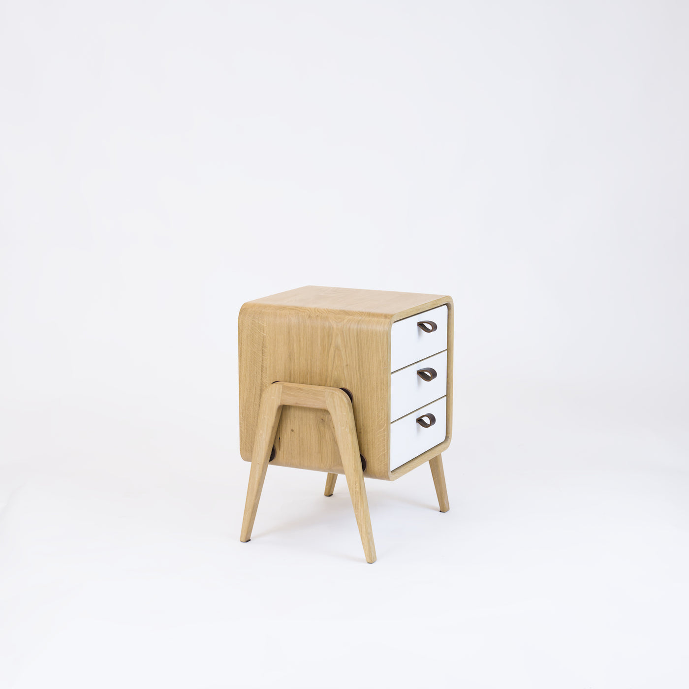 Low nightstand nm31L. The main corpus is crafted from solid Norwegian oak, featuring 3 drawers with white front.