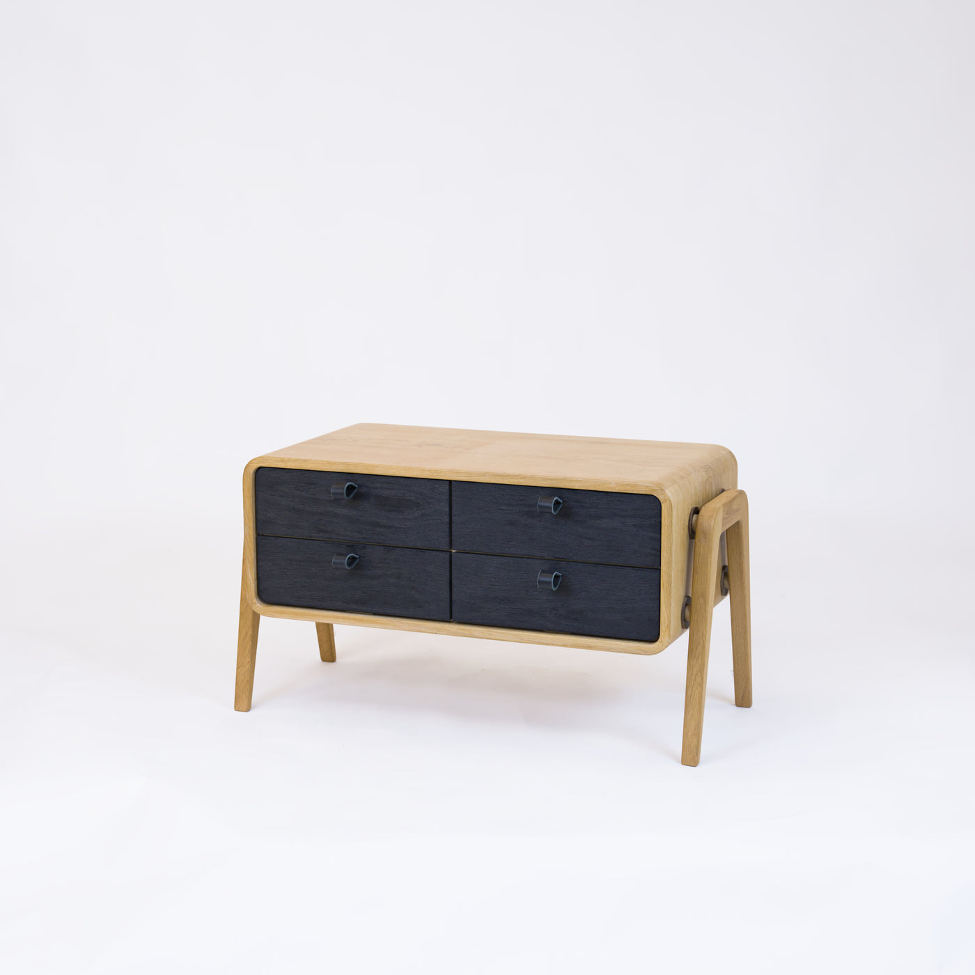 Low sideboard nm22L. The main corpus is crafted from solid Norwegian oak, featuring 4 drawers with black oak fronts.