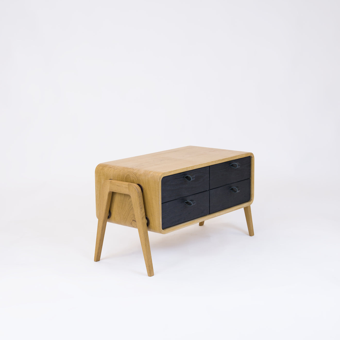 Low sideboard nm22L. The main corpus is crafted from solid Norwegian oak, featuring 4 drawers with black oak fronts.