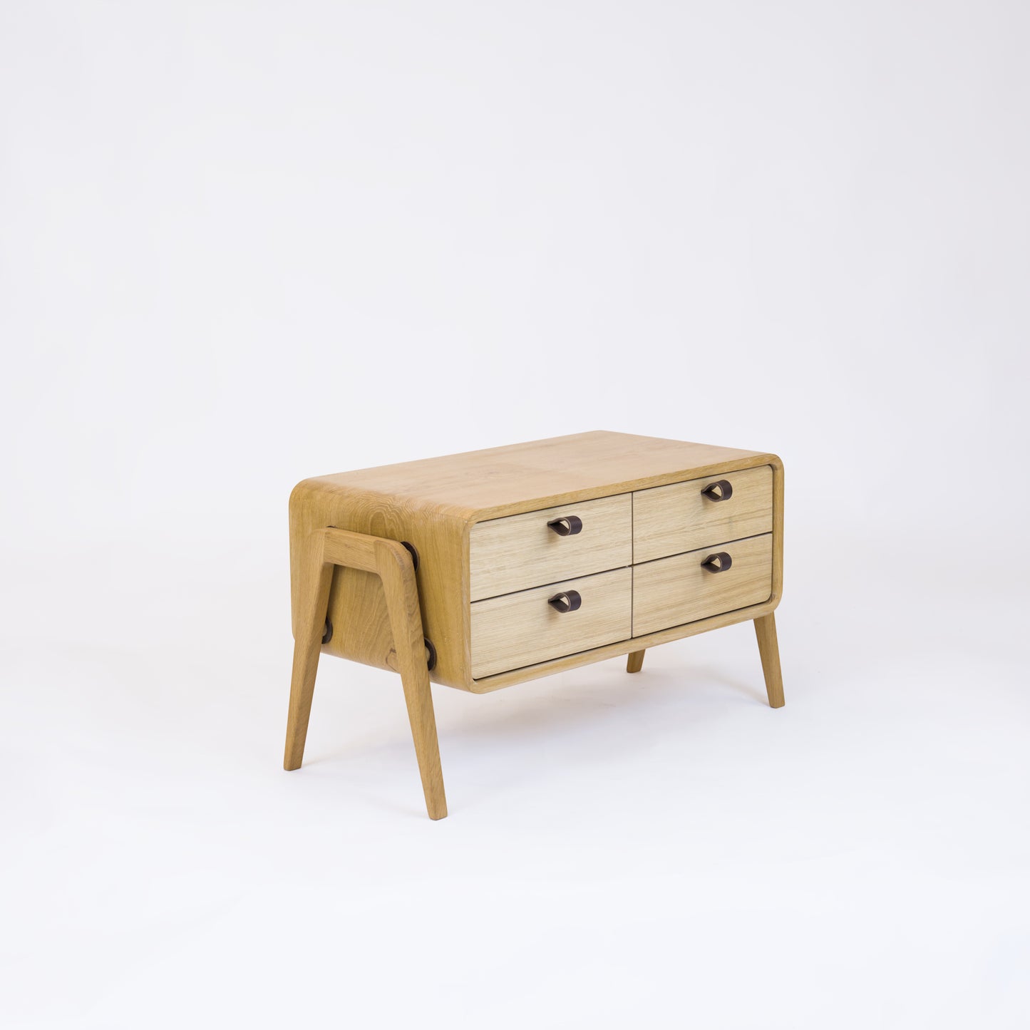 Low sideboard nm22L. The main corpus is crafted from solid Norwegian oak, featuring 4 drawers with natural oak fronts.