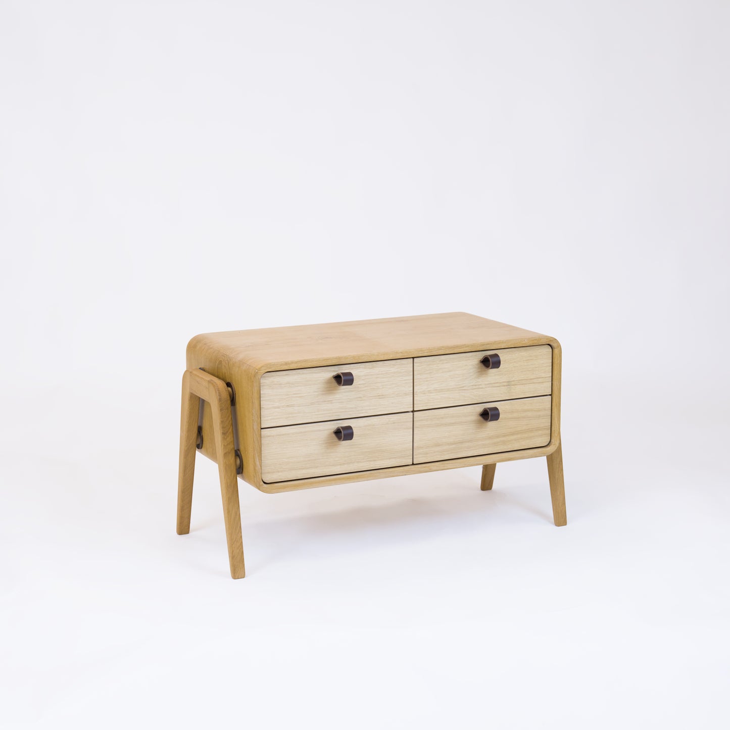 Low sideboard nm22L. The main corpus is crafted from solid Norwegian oak, featuring 4 drawers with natural oak fronts.