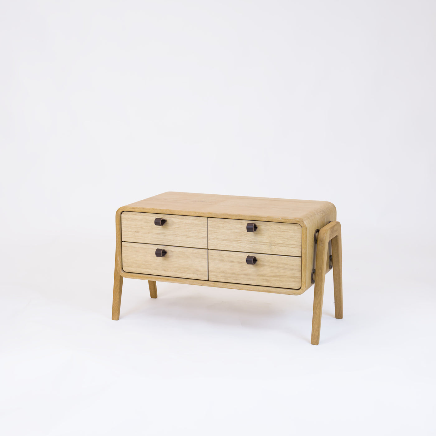 Low sideboard nm22L. The main corpus is crafted from solid Norwegian oak, featuring 4 drawers with natural oak fronts.